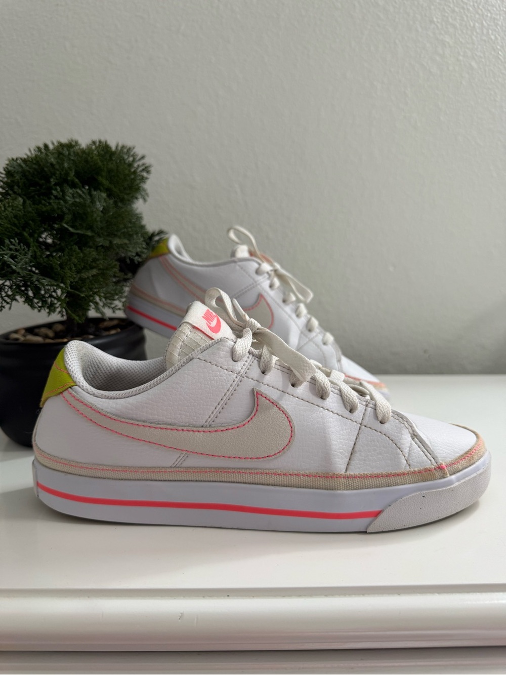 Nike Women’s White Sneakers with Pink and Yellow Accents